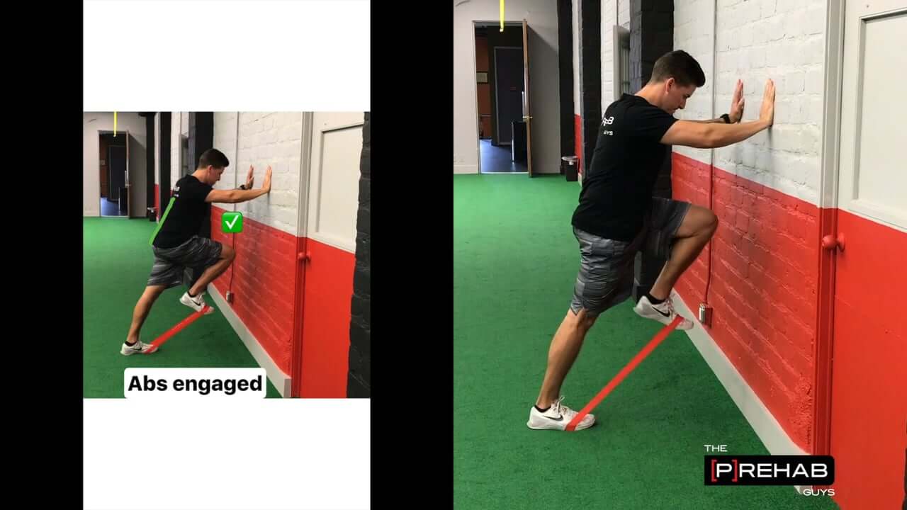 Standing Psoas March With Wall Support [P]rehab