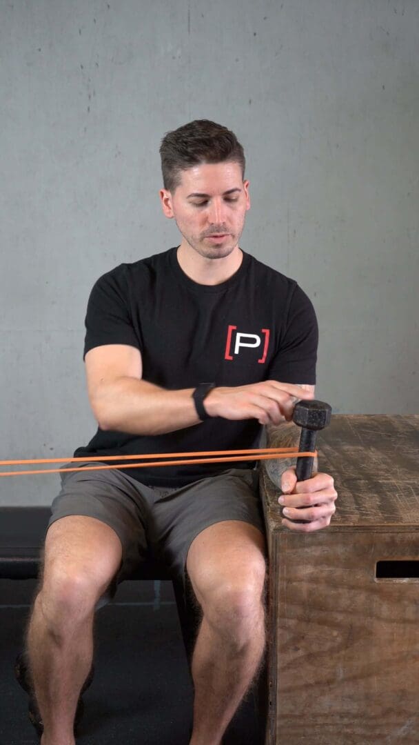 Eccentric Elbow Supination - Elbow Bent, Dumbbell, Band - [P]rehab