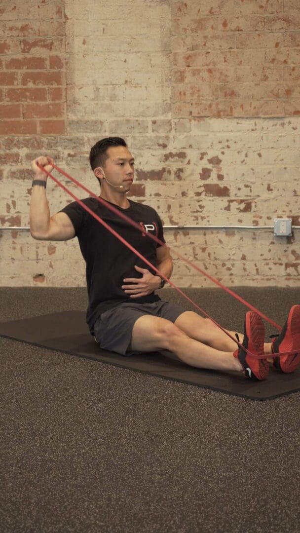 Single Arm Long Sitting Overhead Press Band [P]rehab