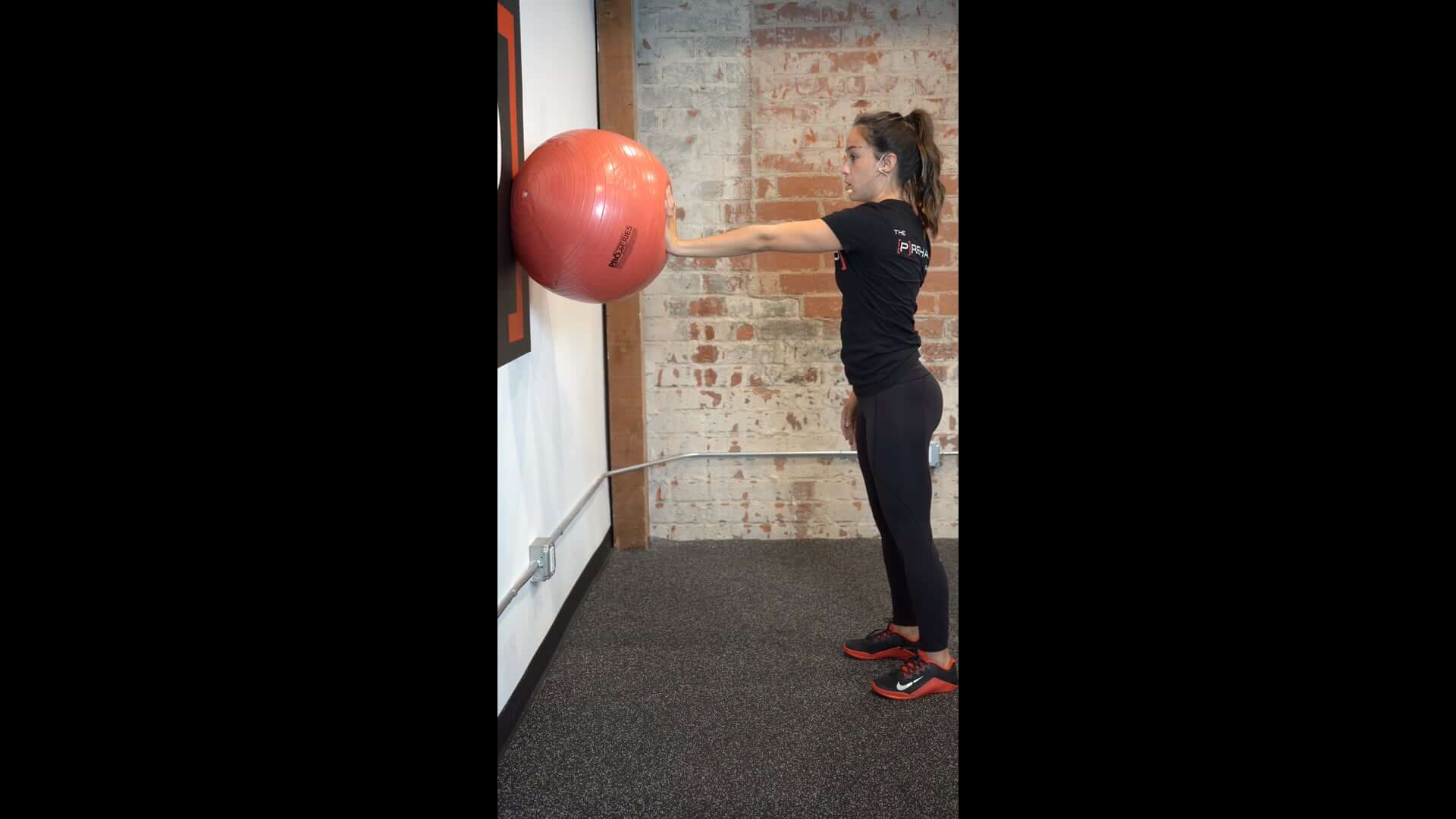 Standing Scapular Punch Swissball, Wall Supported [P]rehab