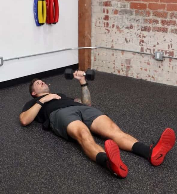 Single Arm Hollow Hold Flutter Kick - Dumbbell - [P]rehab